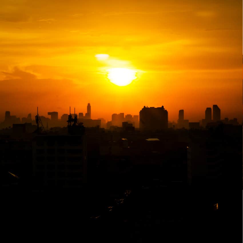 sun over city