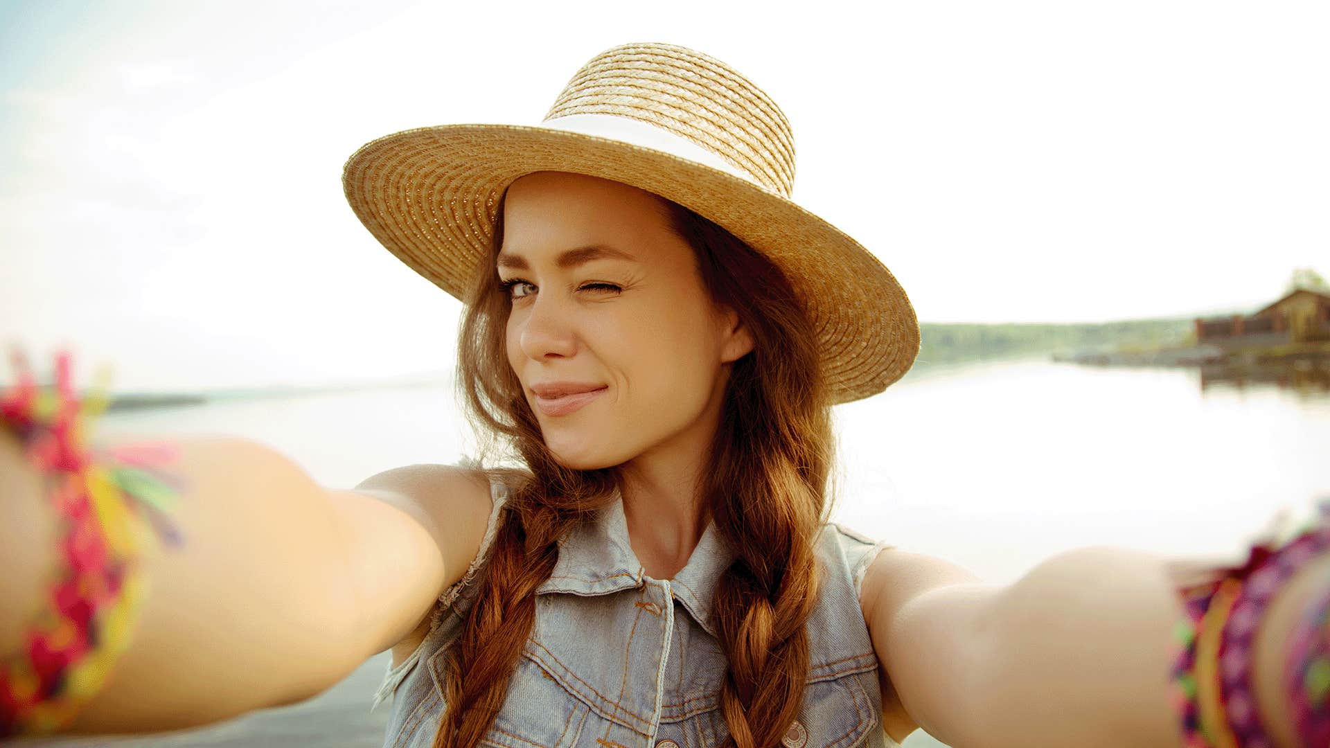 happy woman taking a selfie outdoors