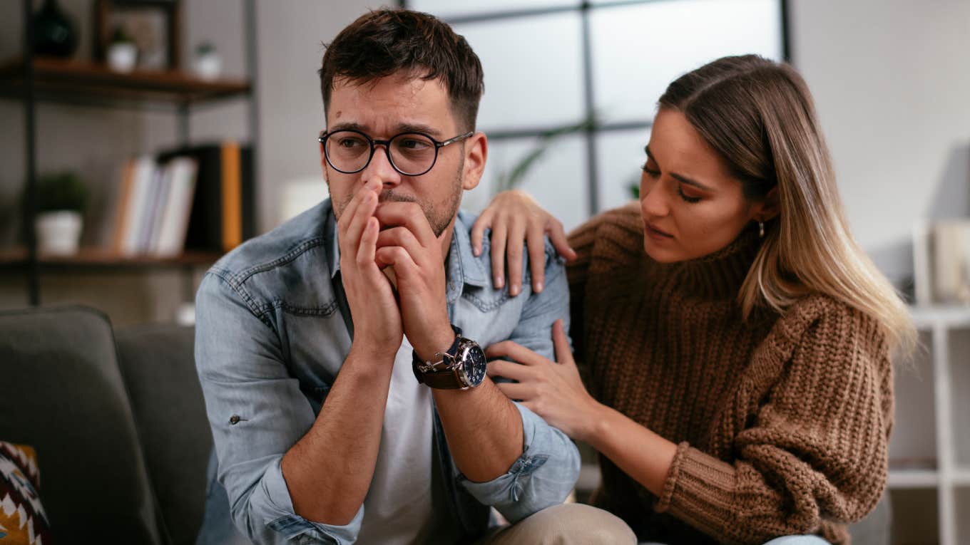 woman comforting upset boyfriend