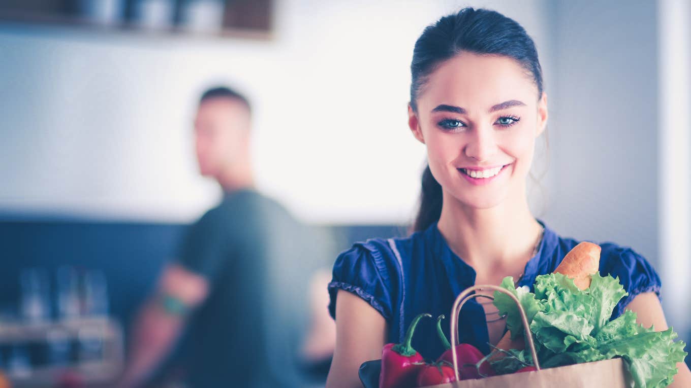 woman holding groceries