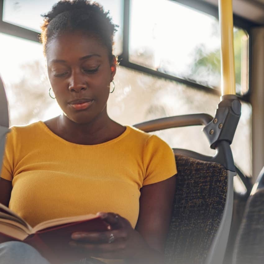 woman sitting on bus 