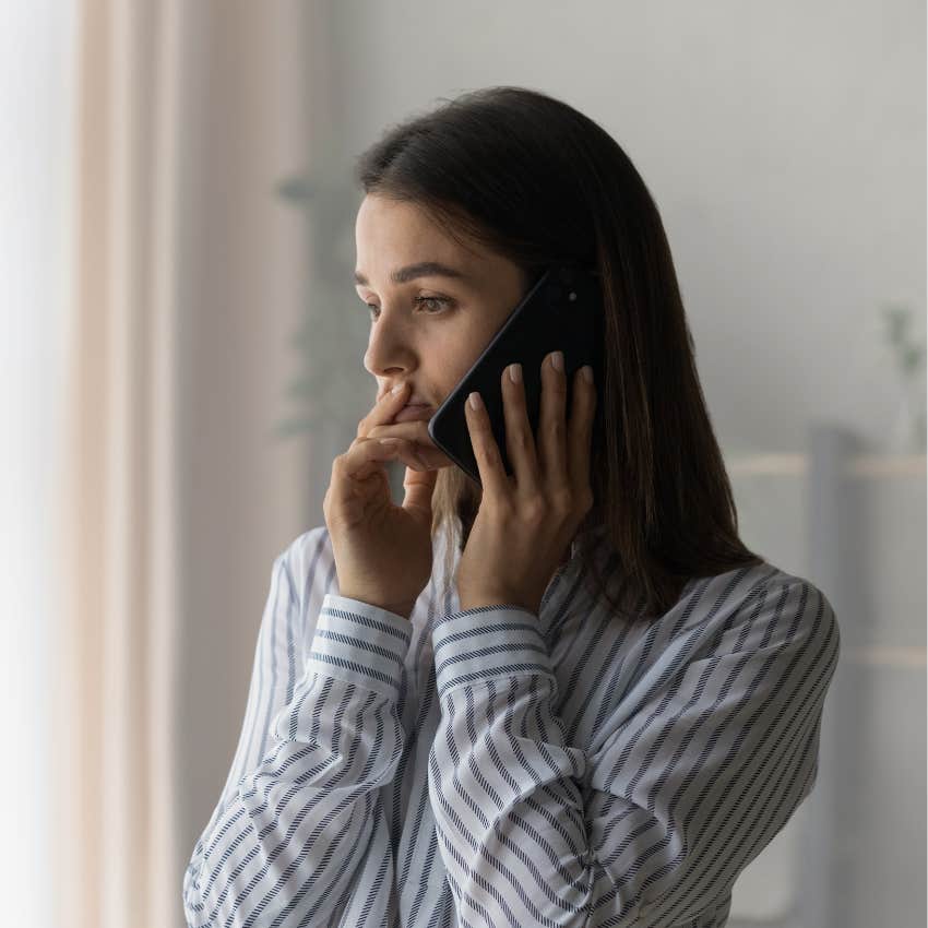 Upset autistic woman on the phone. 