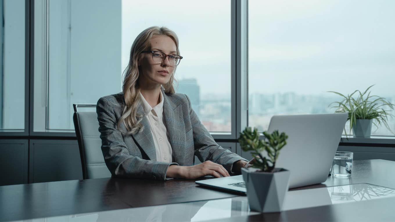 woman sitting at desk 