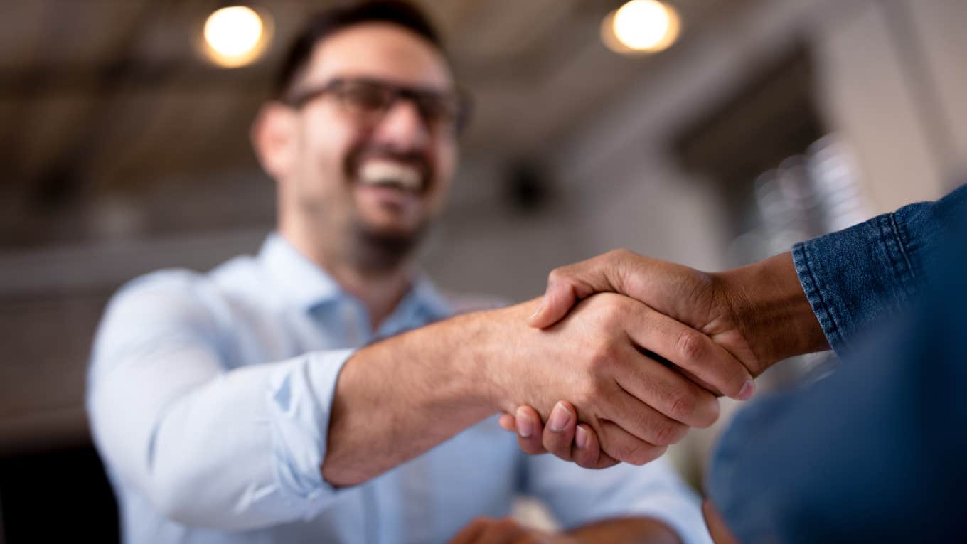 Business people shaking hands.