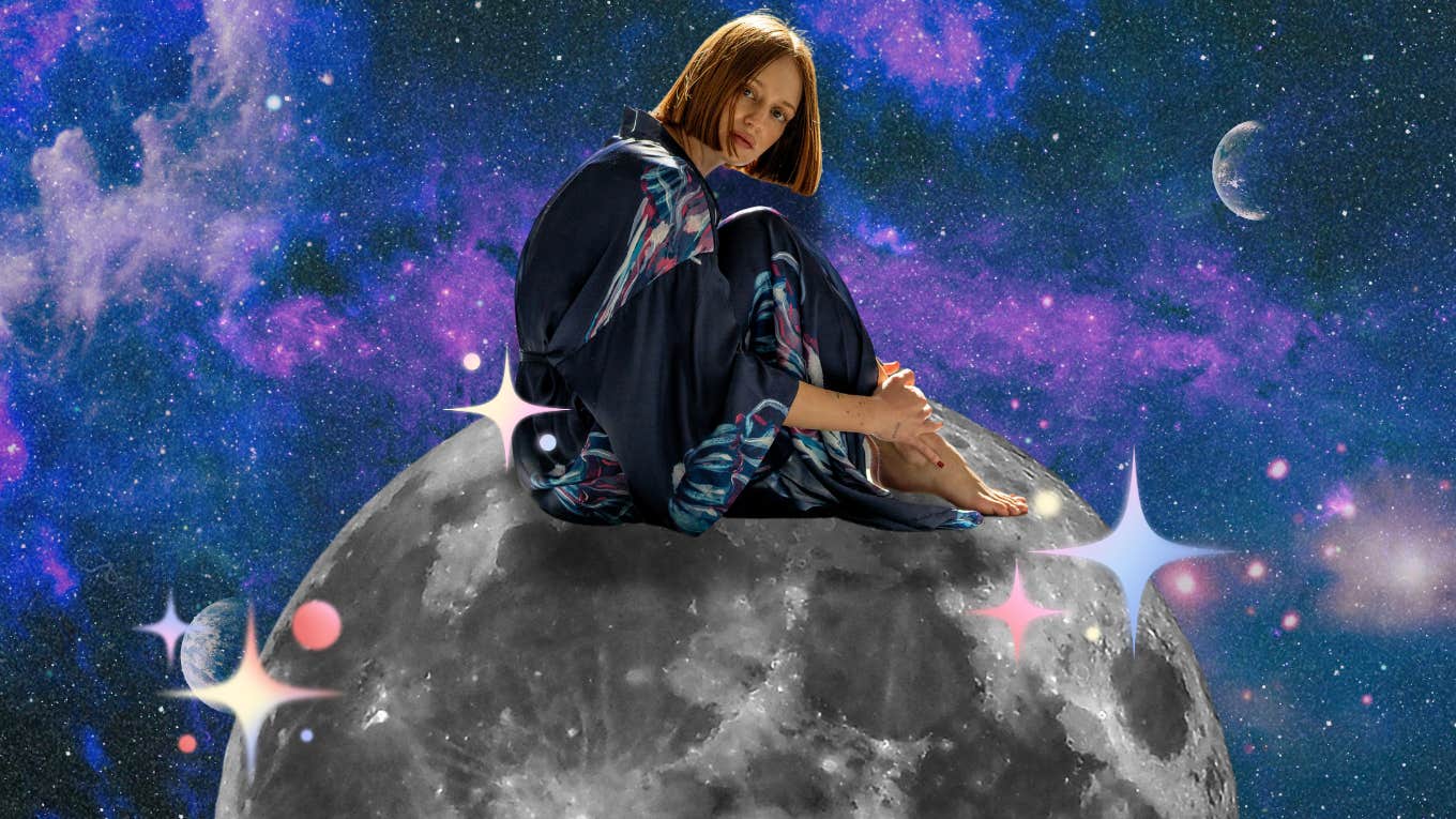 woman sitting on the moon being tested by universe in july 2024