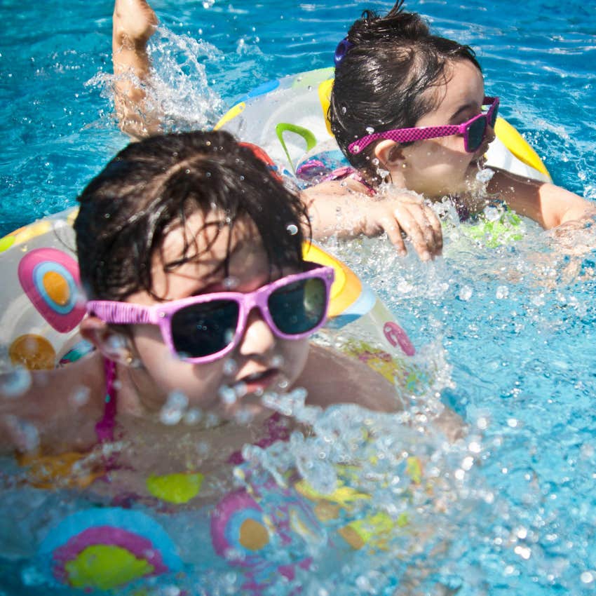 kids swimming in a pool