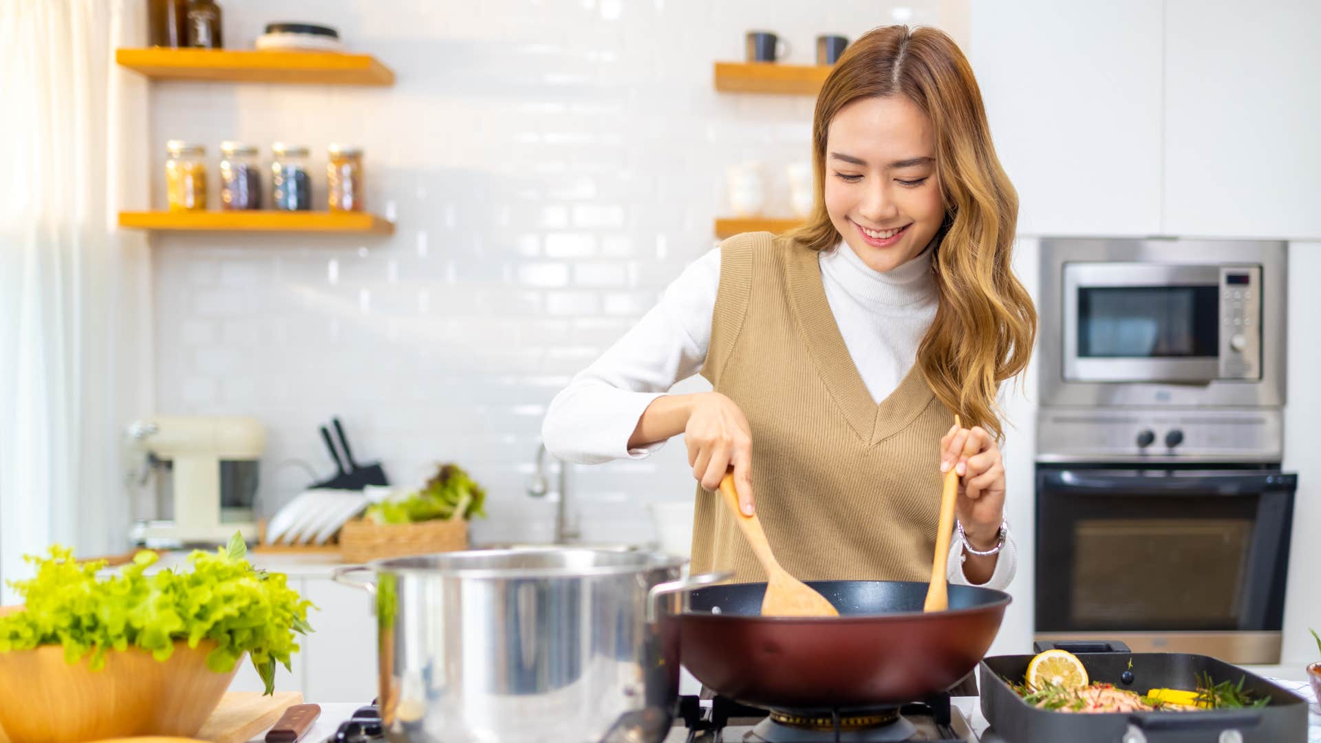 woman cooking in kitchen 