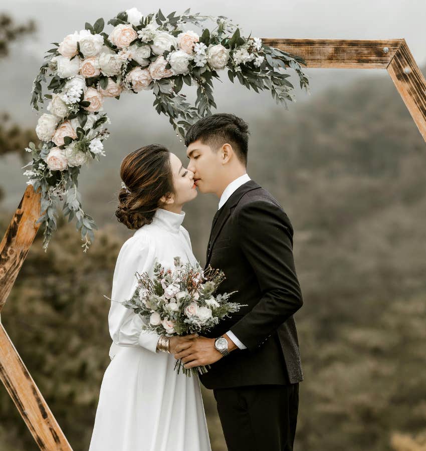 bride and groom kissing