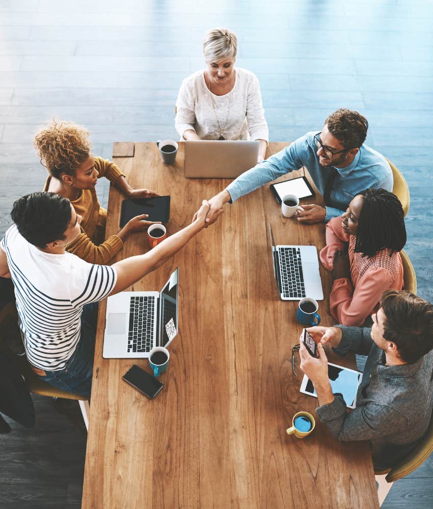 coworkers sitting at a table