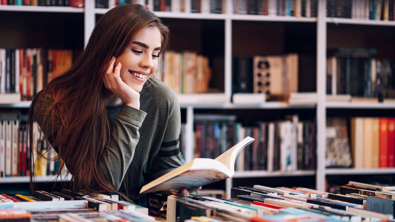 woman who loves reading in a bookstore