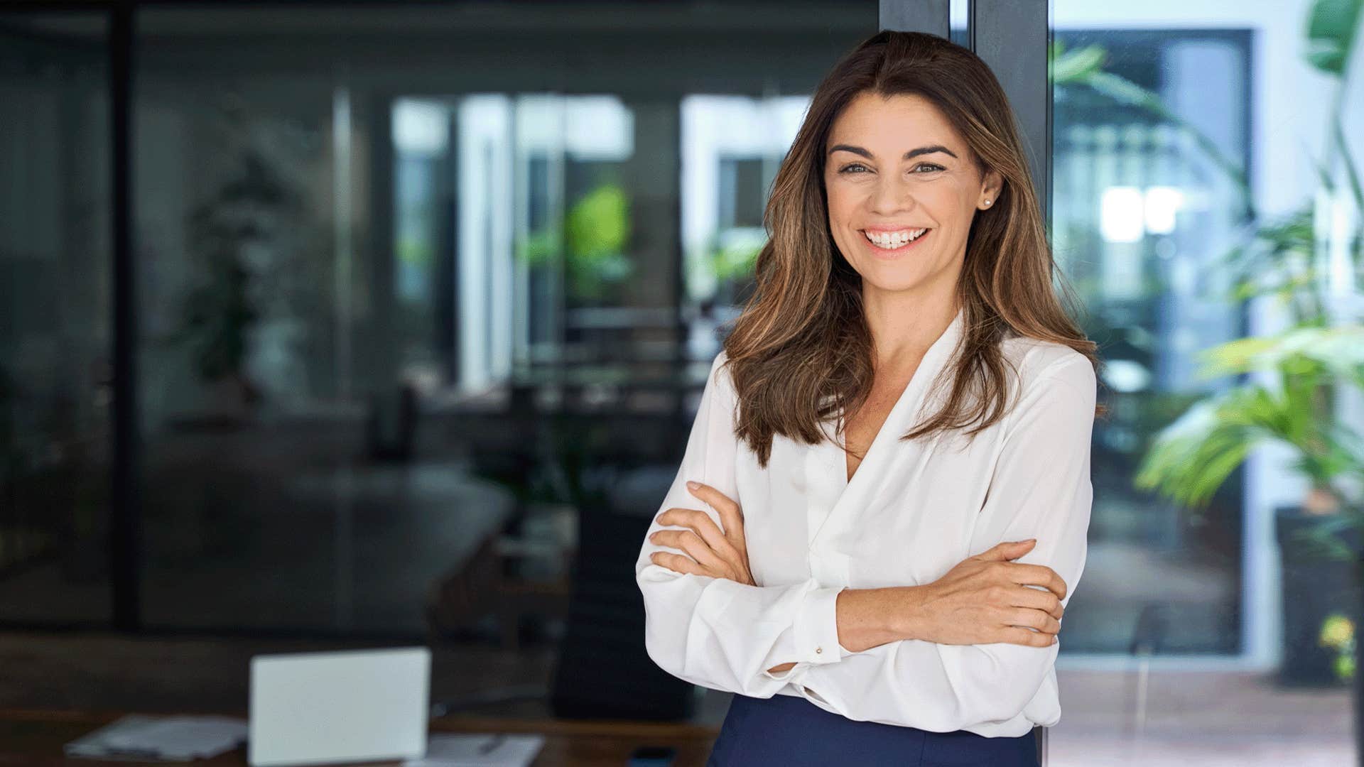 classy woman smiling and looking confident