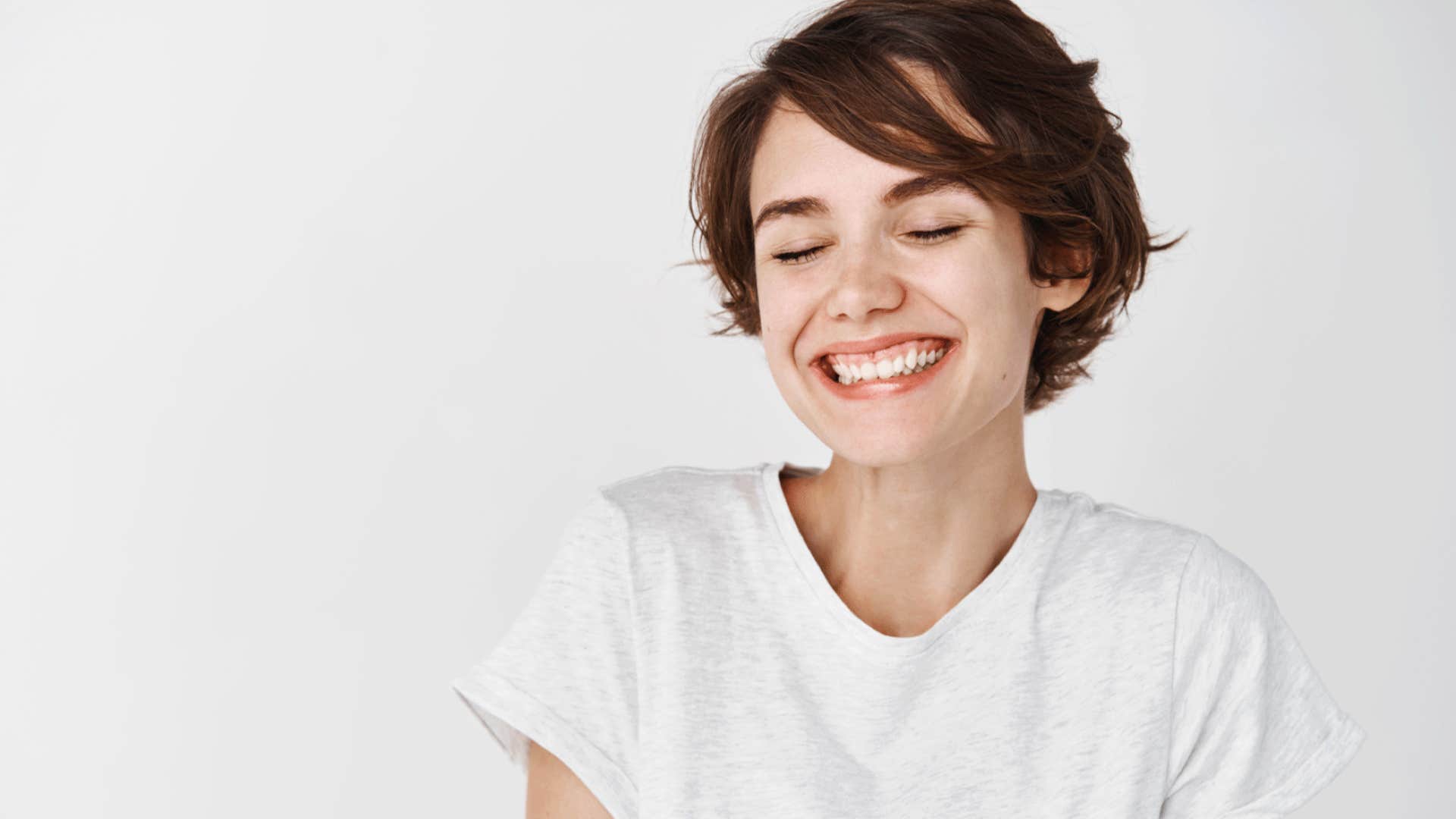 classy woman smiling and looking positive