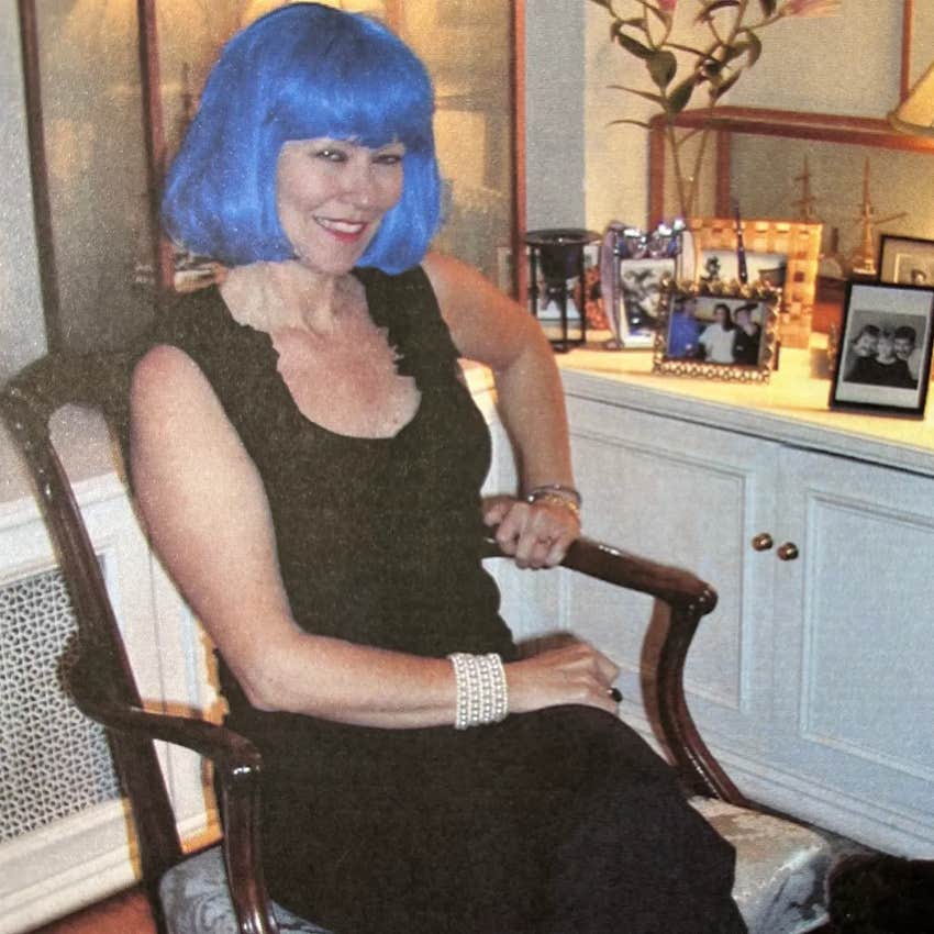 Author wearing a blue wig after losing her hair to cancer