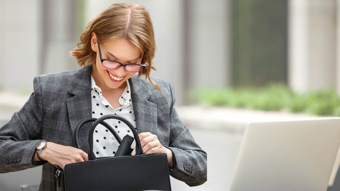 Woman looking through her purse in job interview.