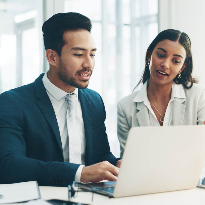 man and woman working together