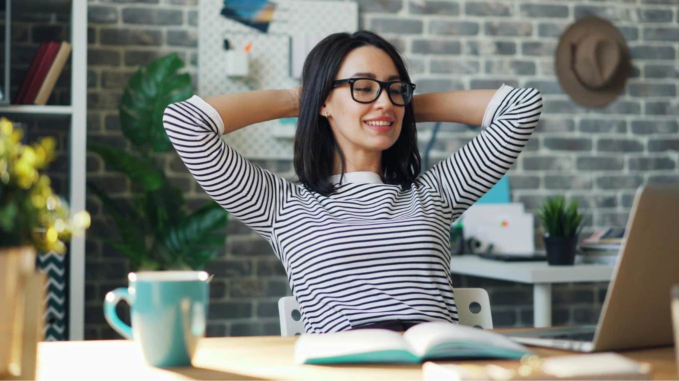 woman relaxing at desk