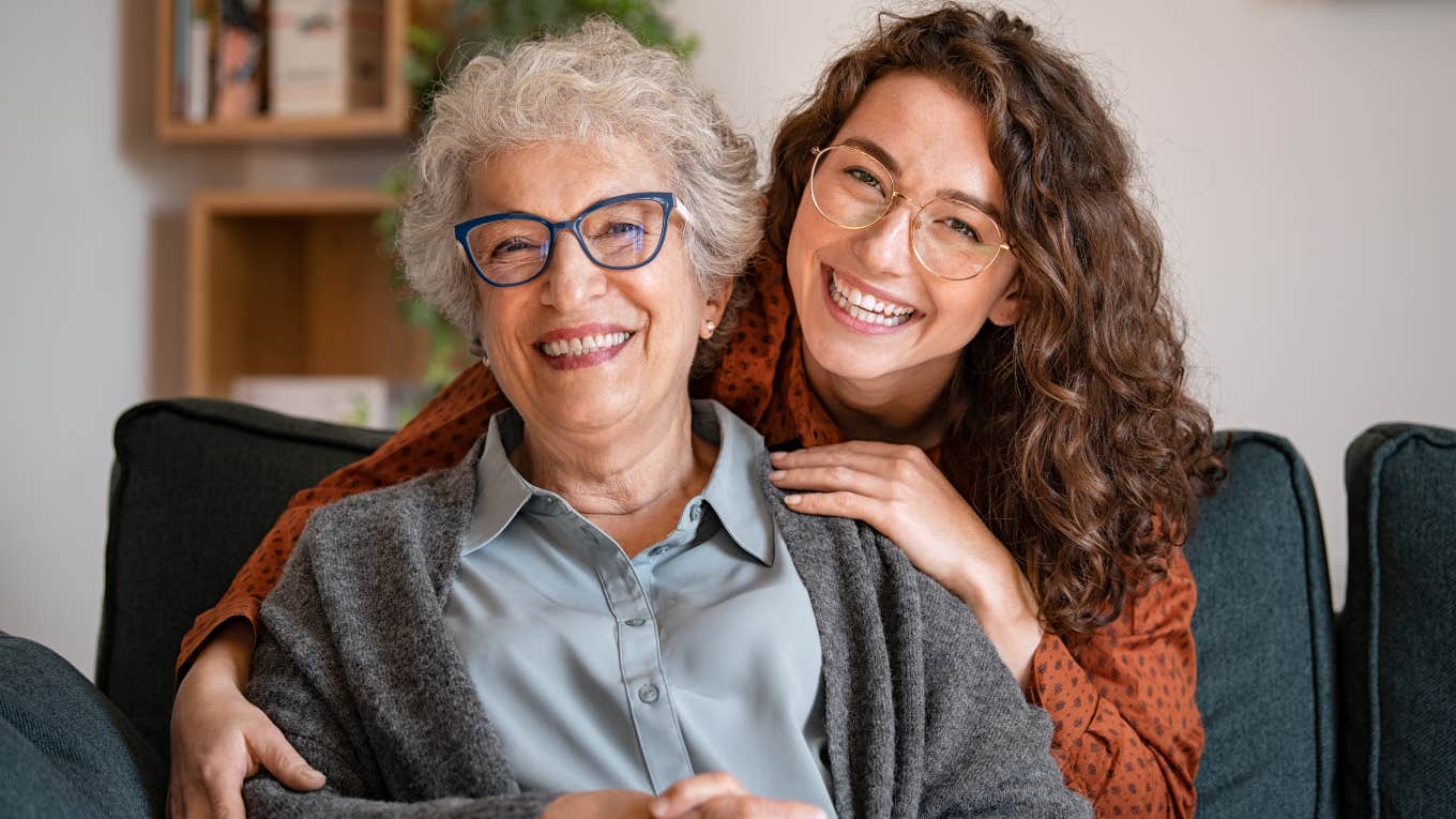 young woman with her arms around her grandma