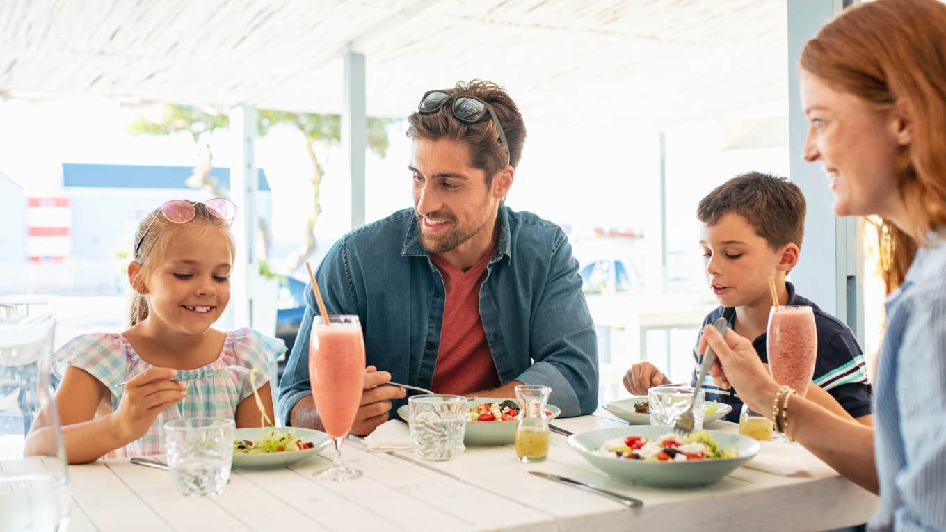 family eating together in restaurant