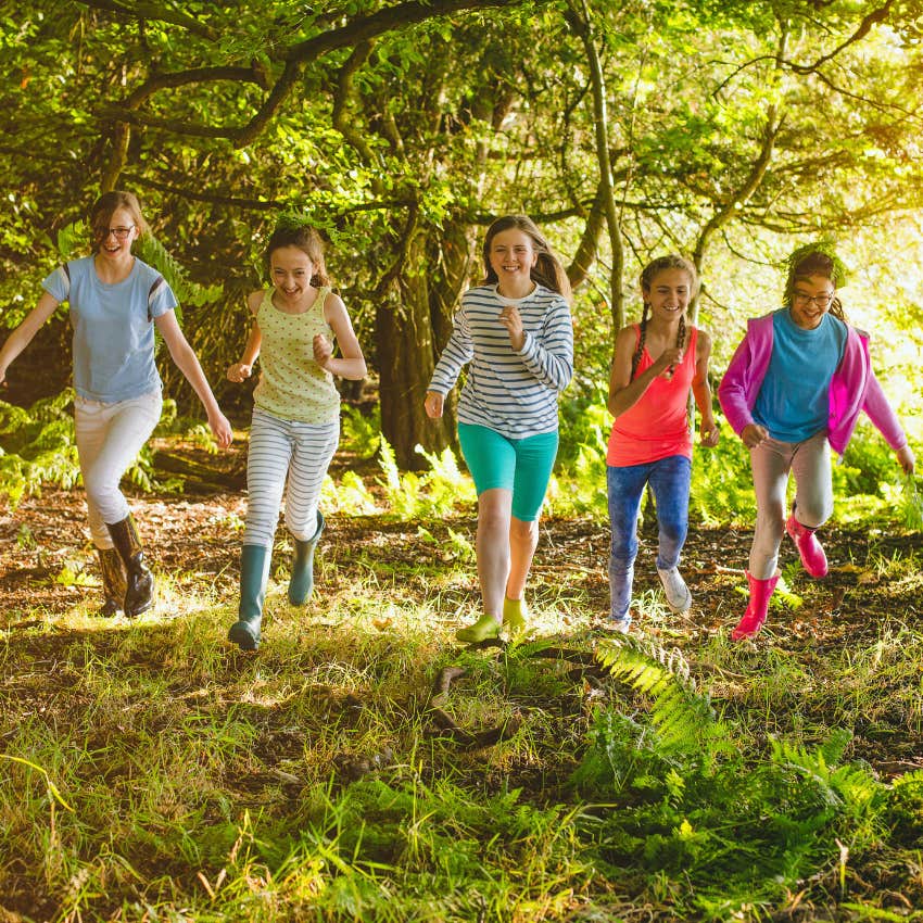 girls exploring the woods at sleepaway camp