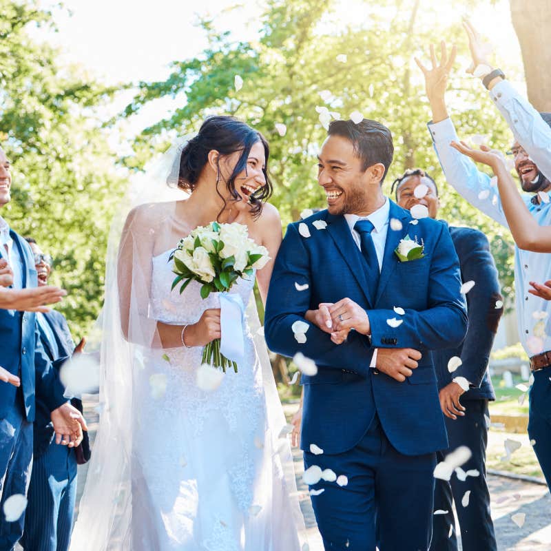 bride and groom walking down aisle