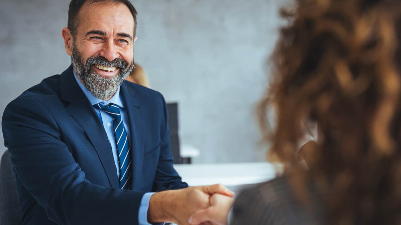 recruiter shaking the hand of a job candidate