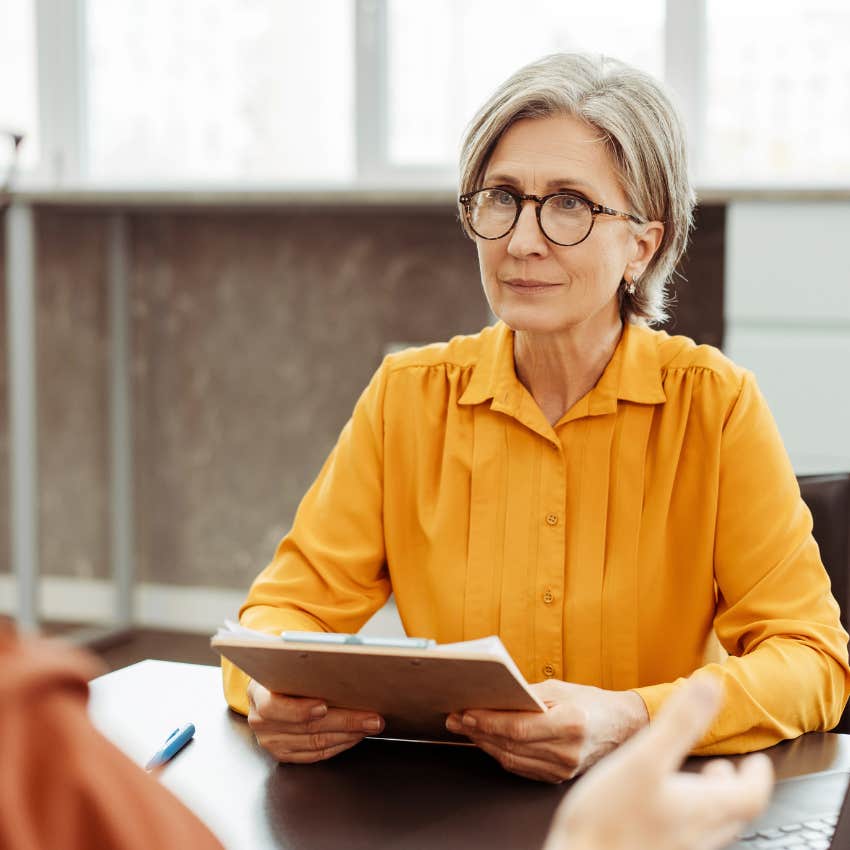 Teacher giving a job interview. 