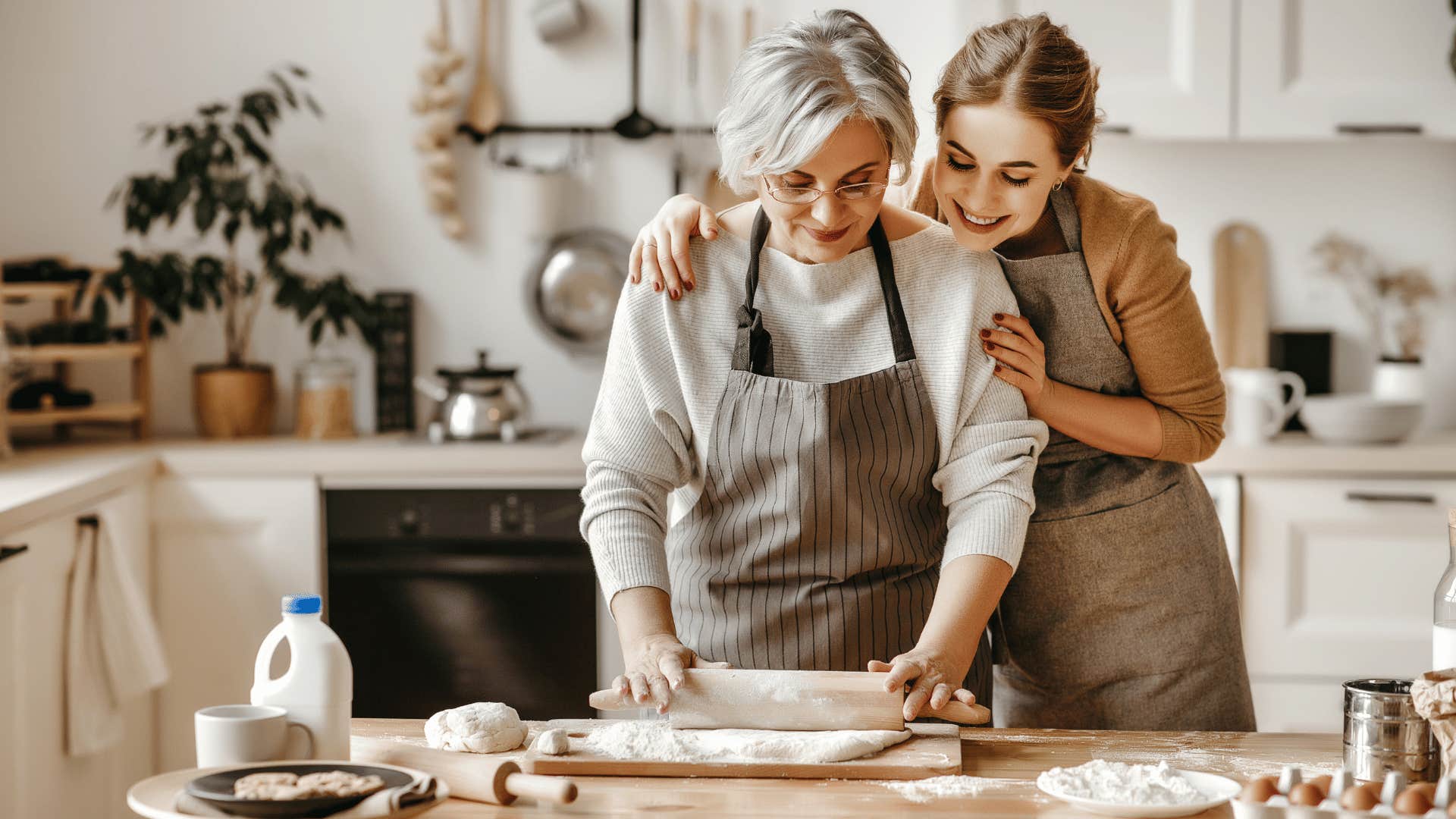 two woman baking something from scratch 