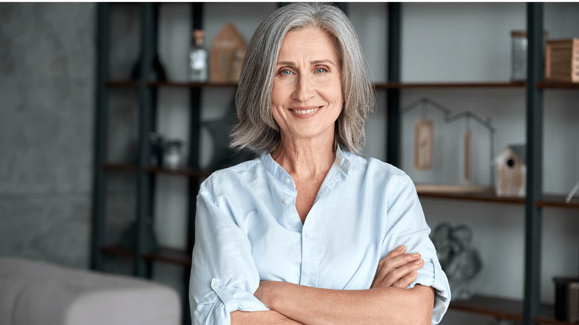 older woman smiling and looking at camera