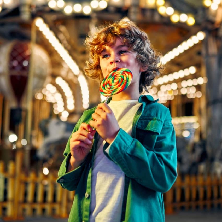 little boy at amusement park