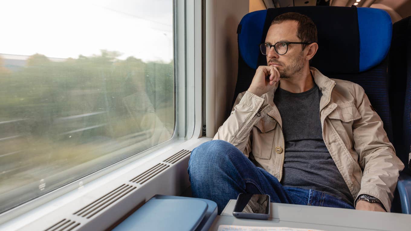 Man eavesdropping on a train