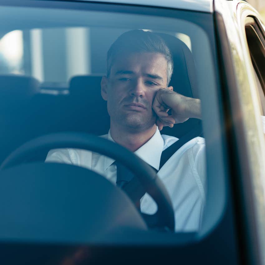 man sitting in traffic