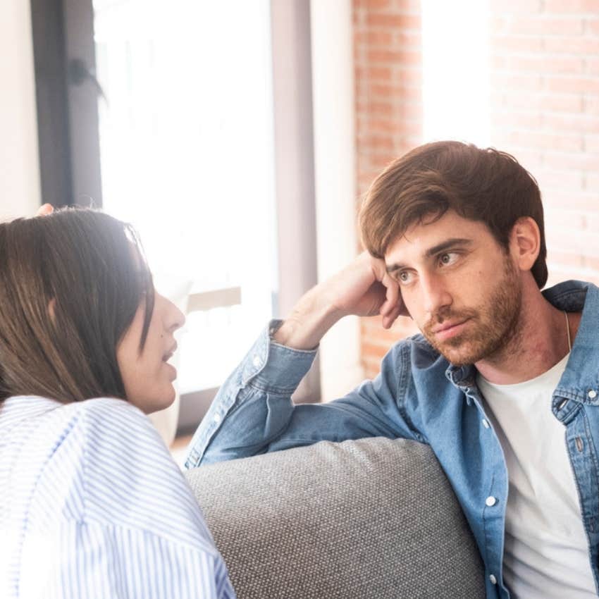 man listening to woman