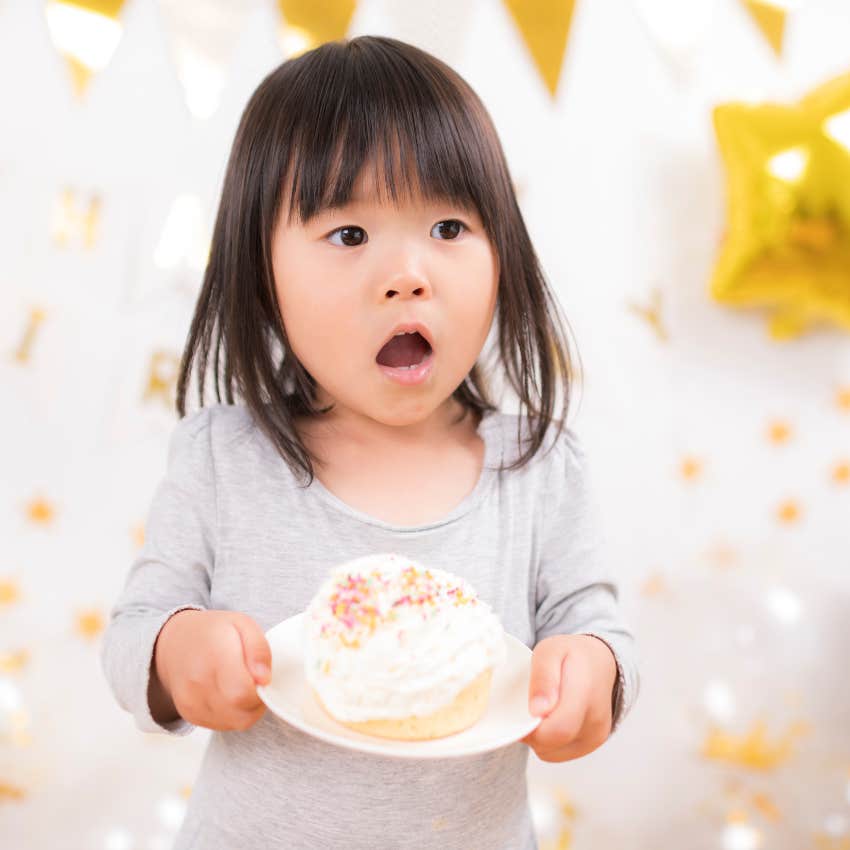little girl with cake 