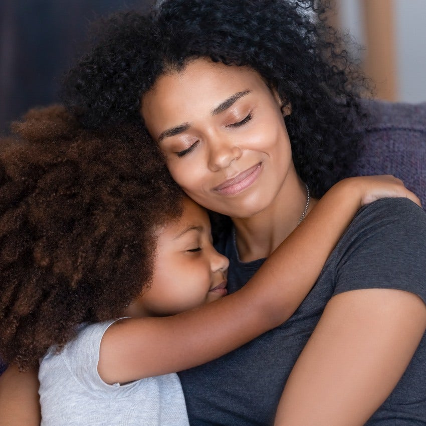 Mom hugging her daughter