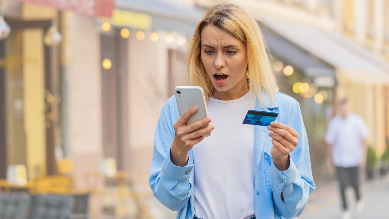 Mom looking at a mistake on her credit card bill 