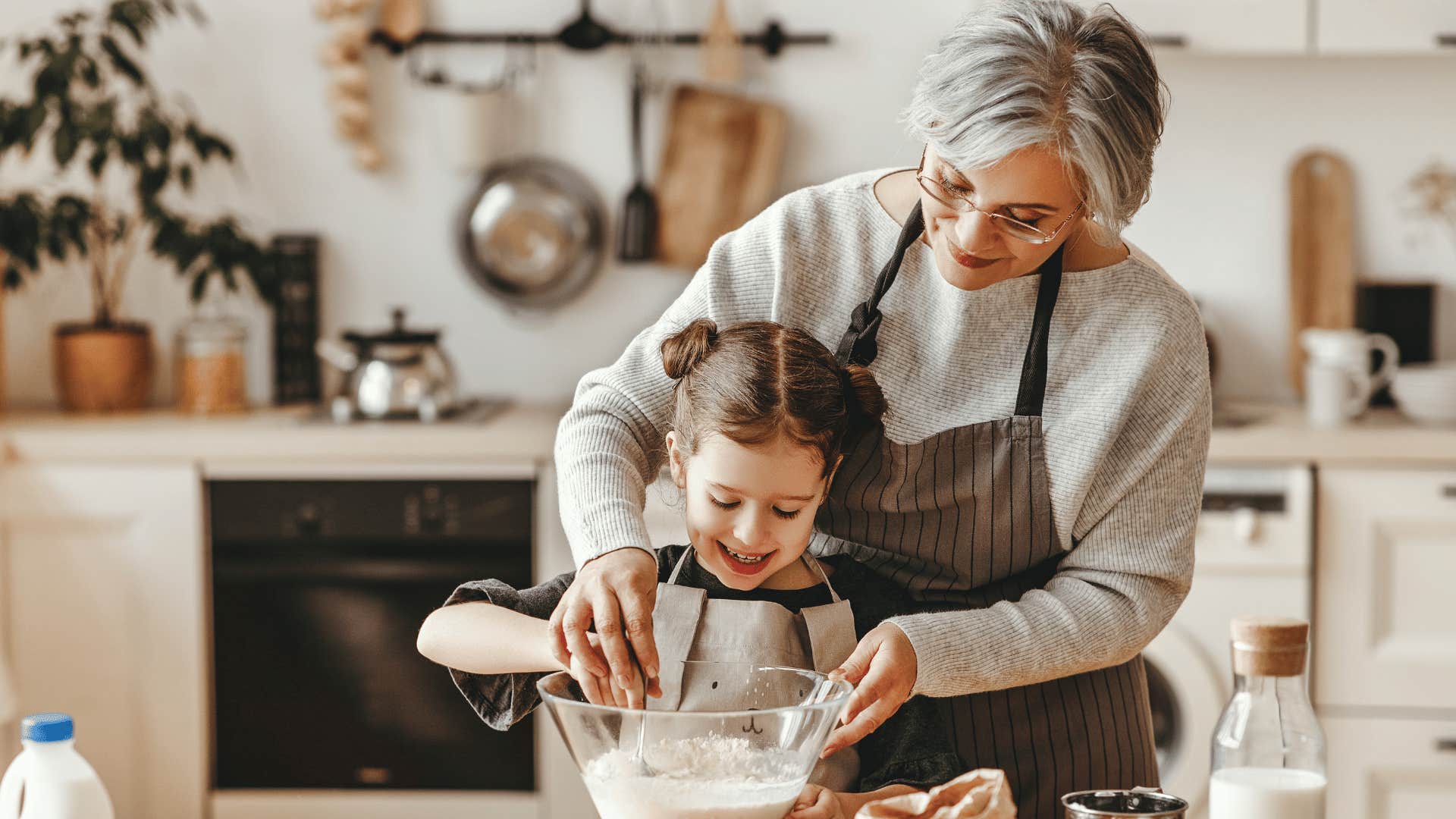 old fashioned woman baking with child