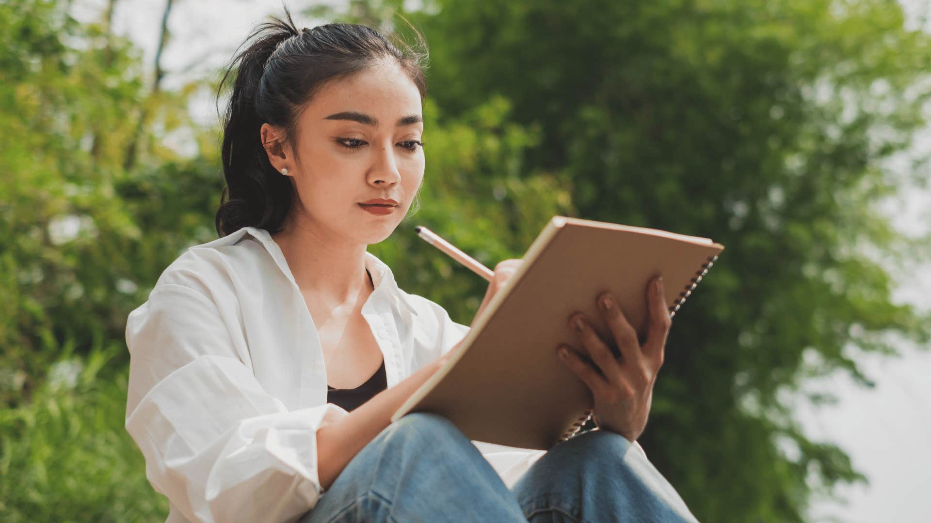 woman writing an old-fashioned letter