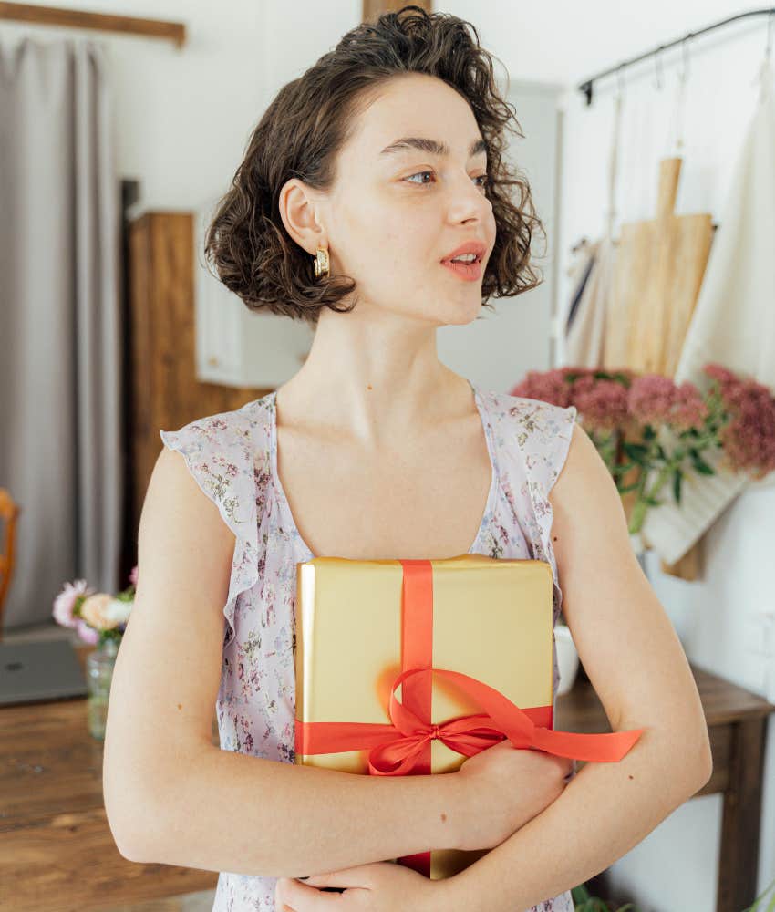 woman holding a gift