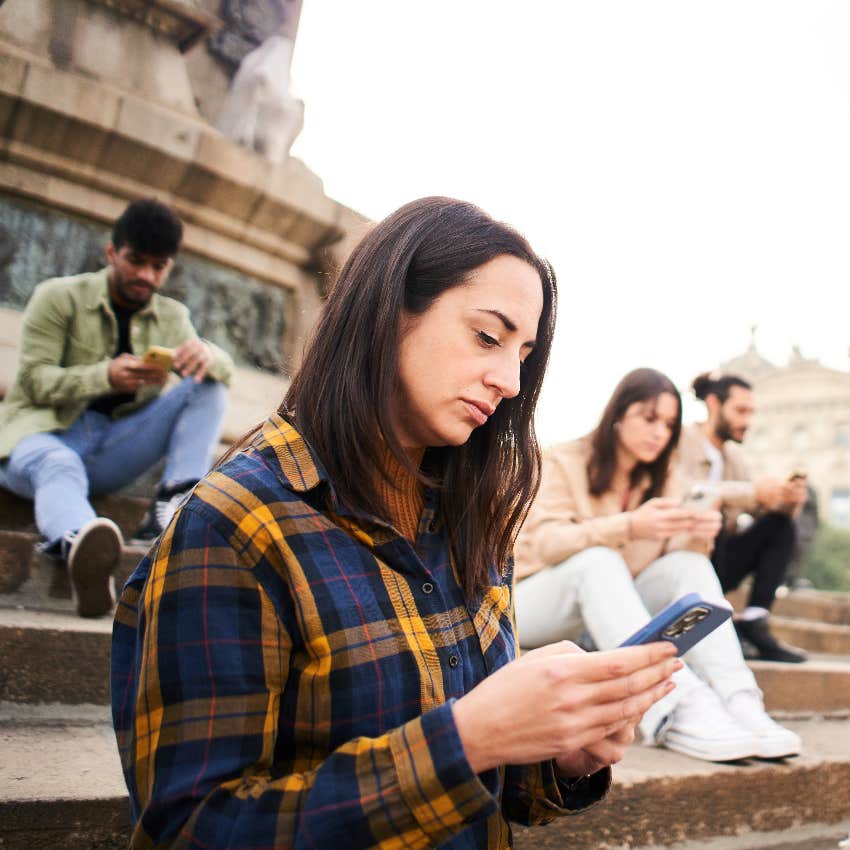 Woman on phone who needs to reduce social media usage