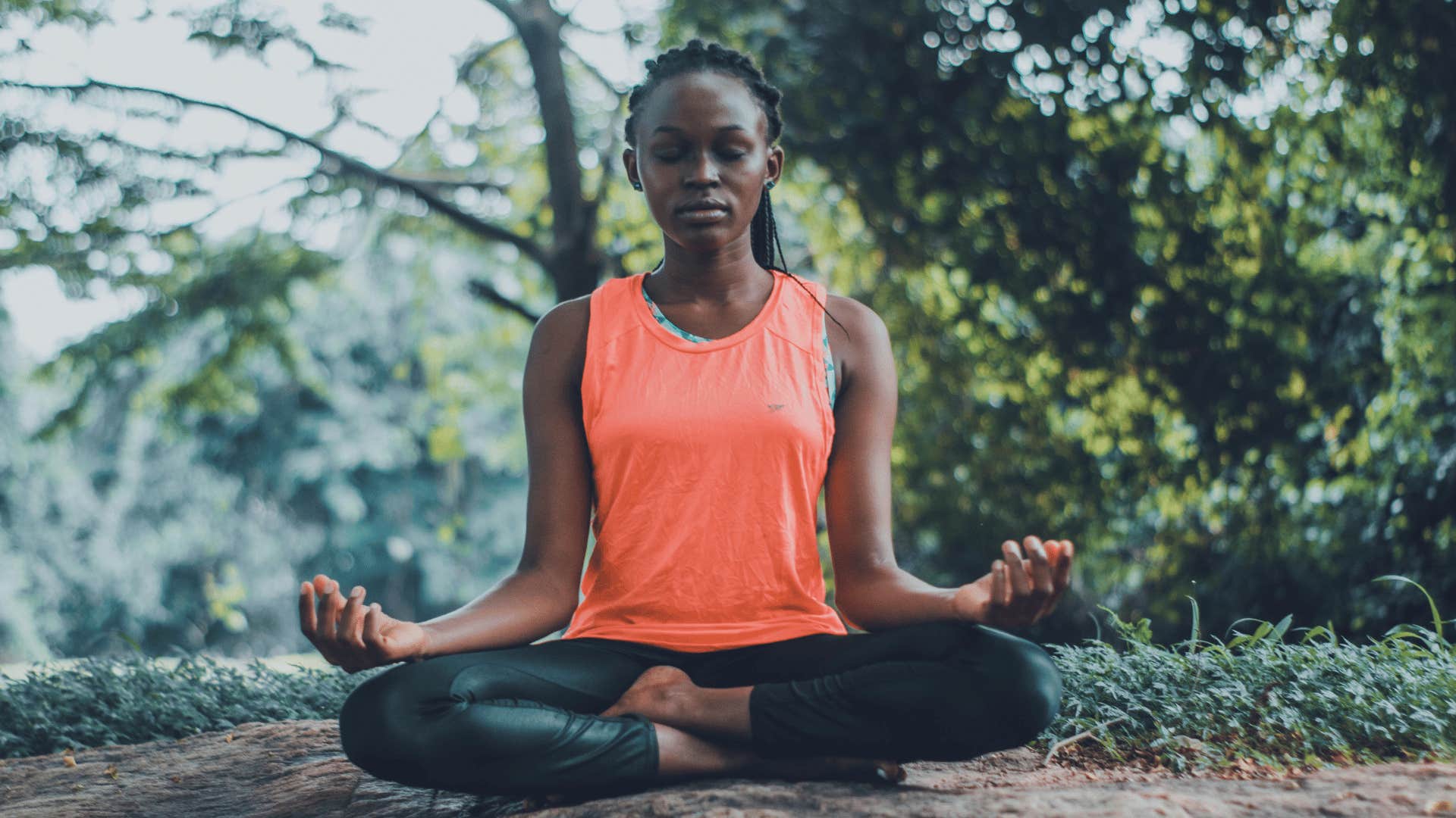 woman meditating outside