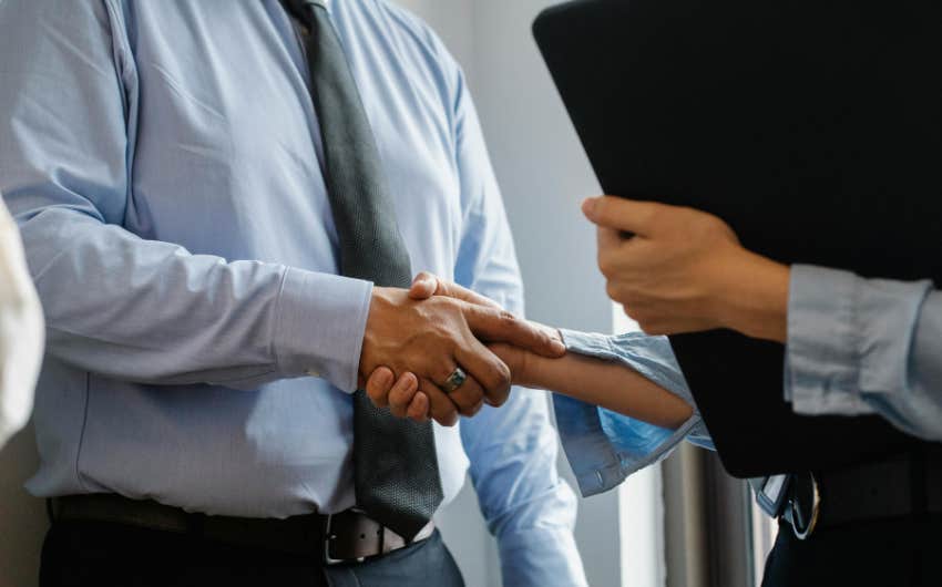 Two people shaking hands