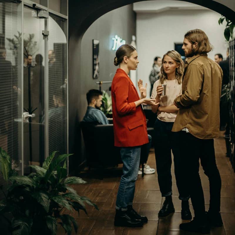 group of people talking at an event