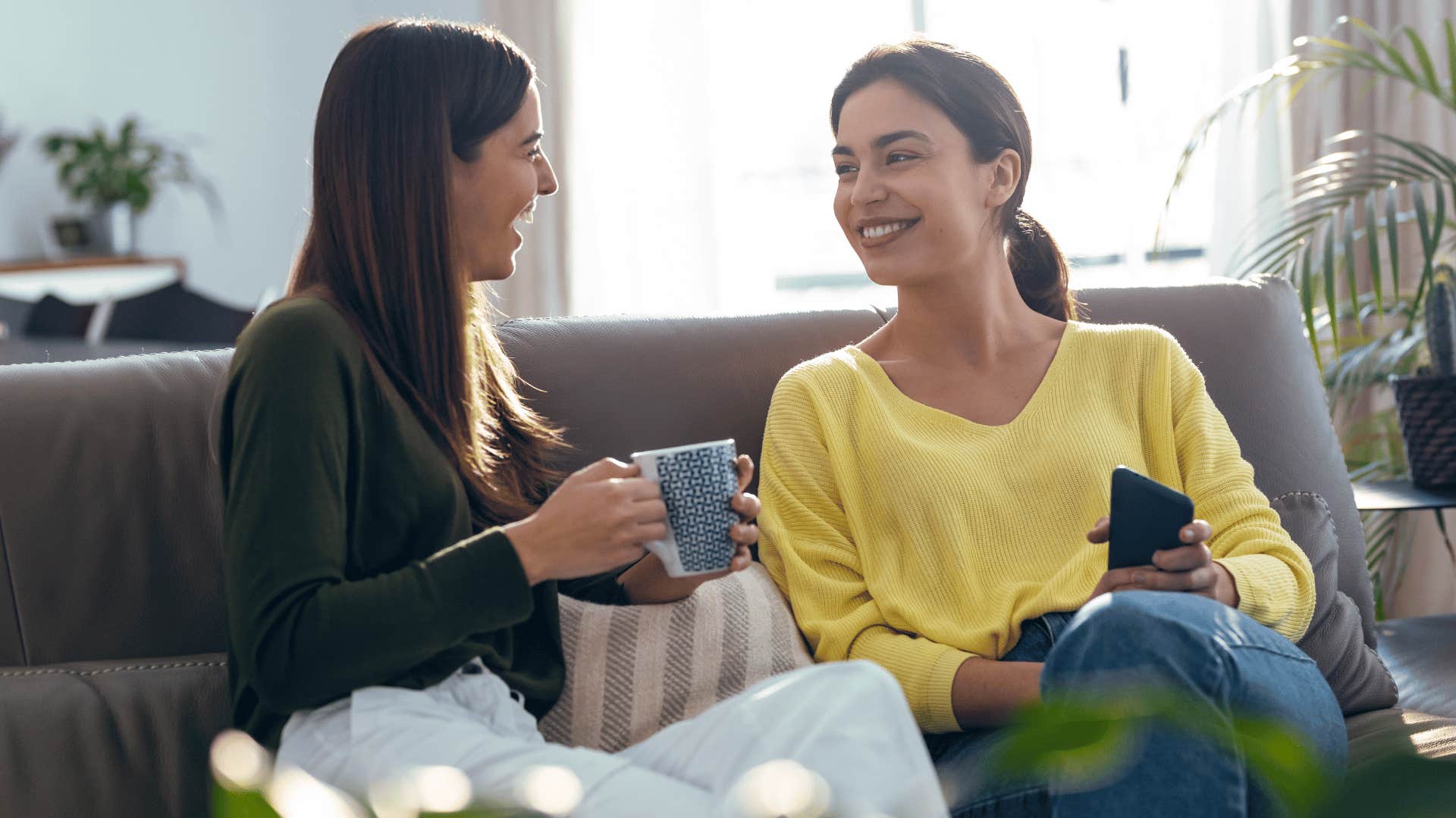 two woman gossiping and judging 