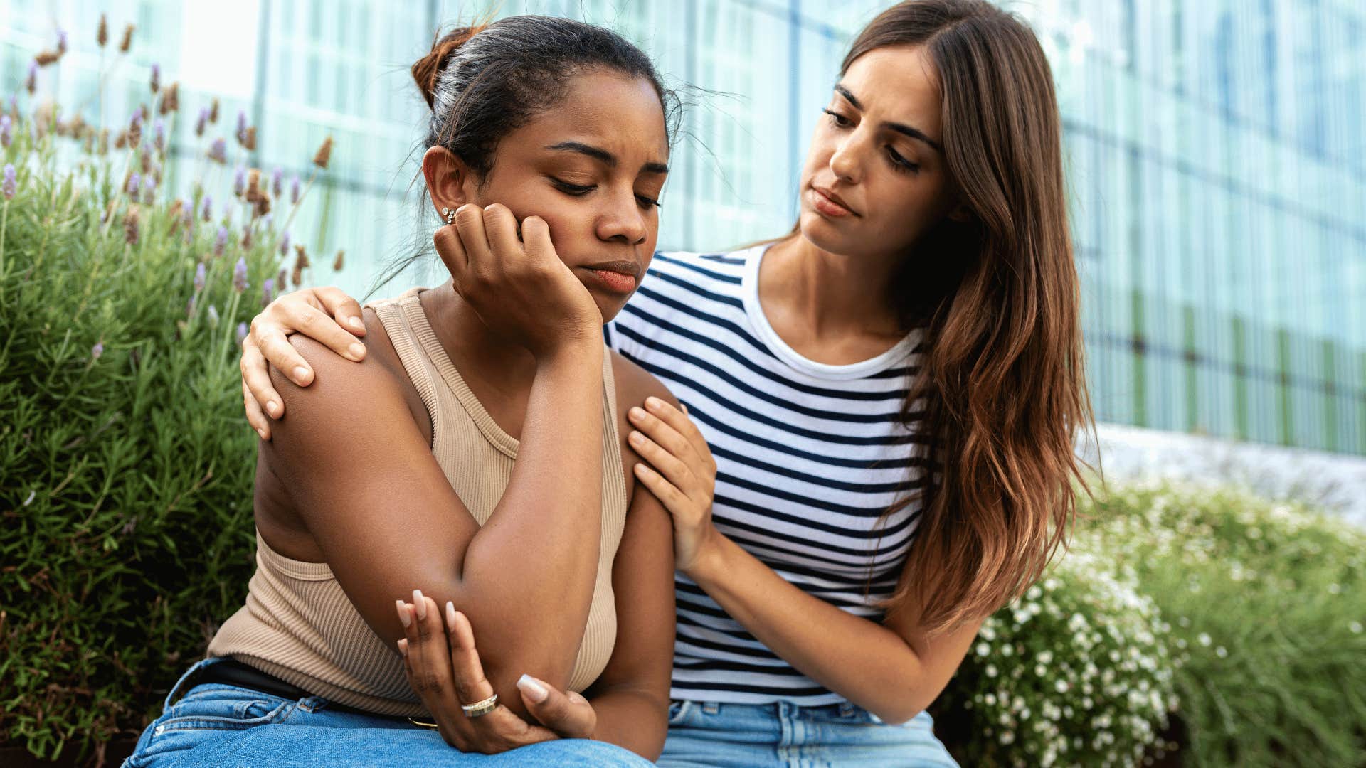 woman saving judgement and comforting friend