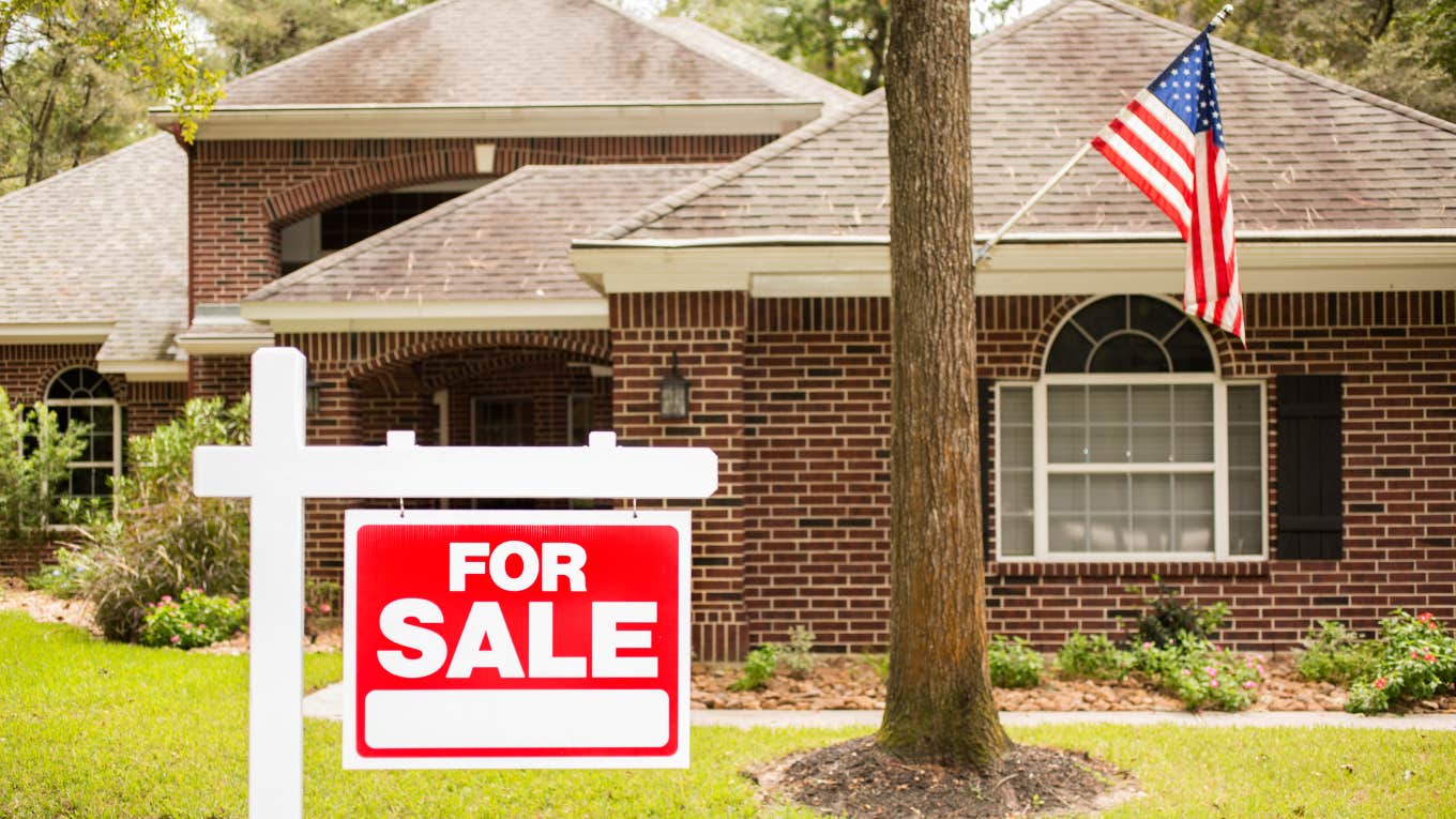 house for sale with a political flag