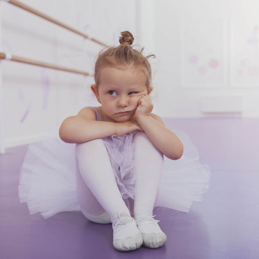 Sad little ballet dancer forced by mother