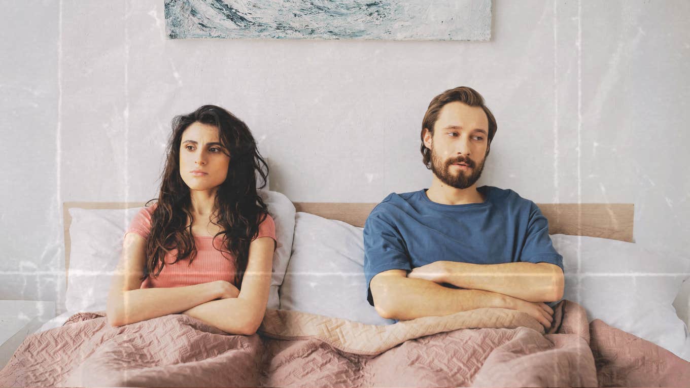 Couple sitting up in bed not touching, sexless marriage 