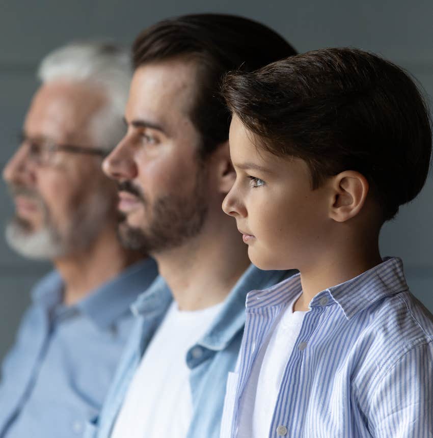 Profile view of Grandfather, father, grandchild