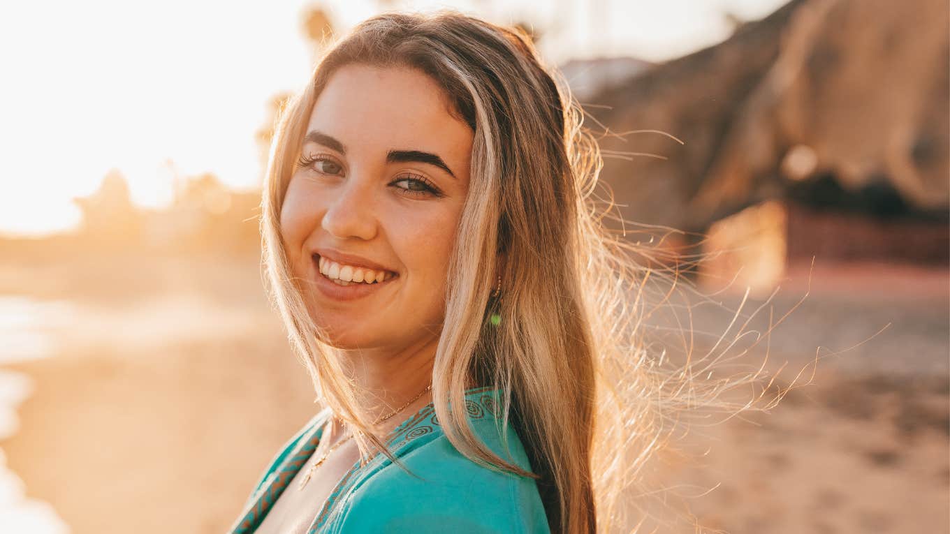 smiling woman feeling free