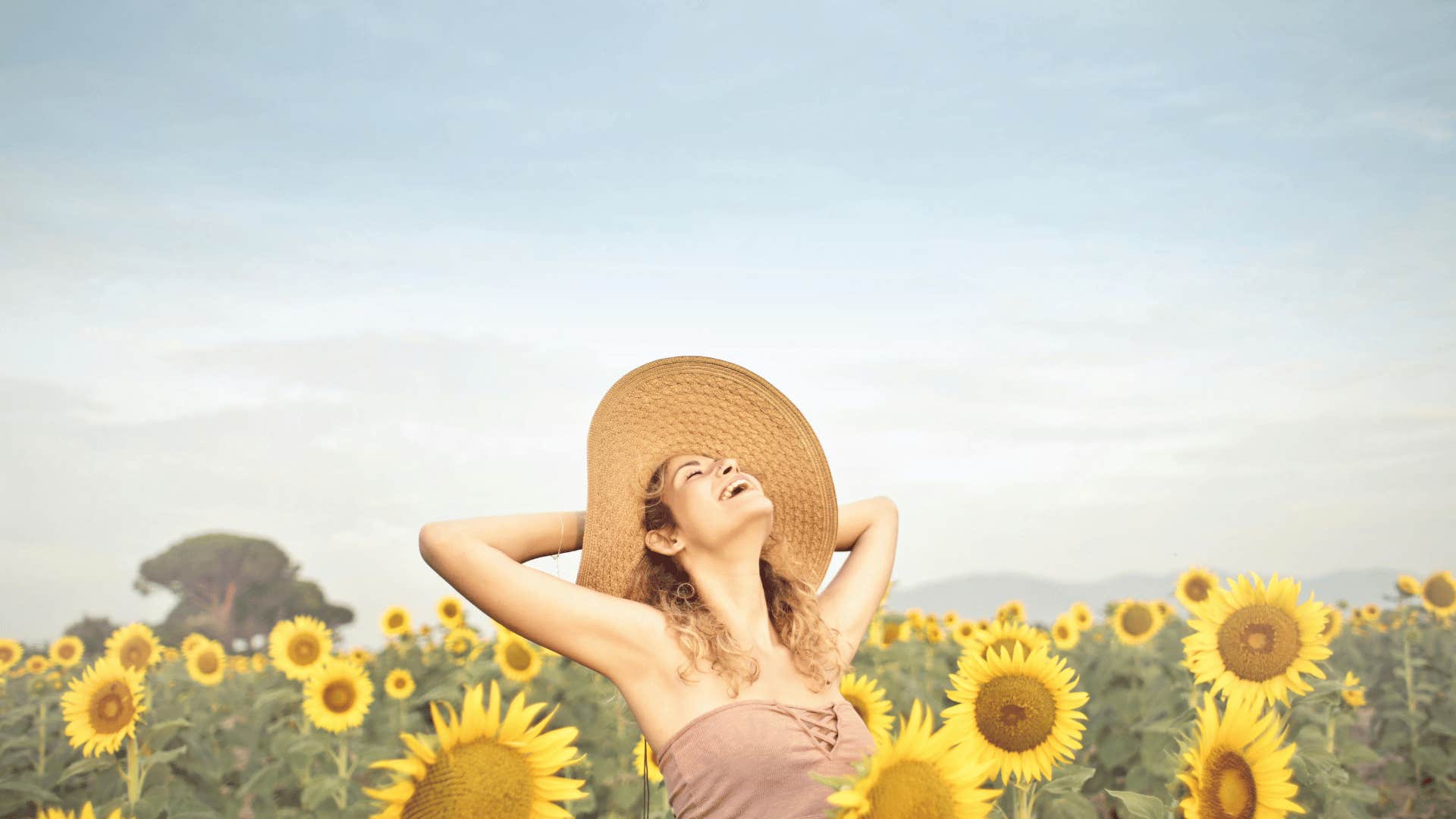 woman living in the present sunflower field
